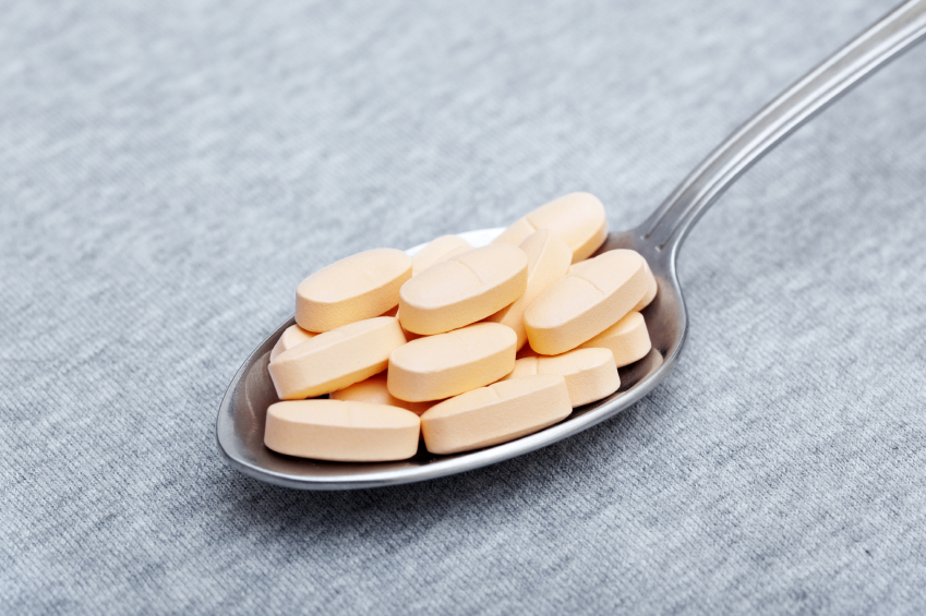 Xanax pain pills on a spoon