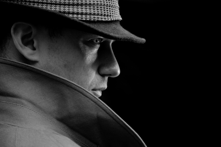 Man wearing Frank Sinatra type of hat.