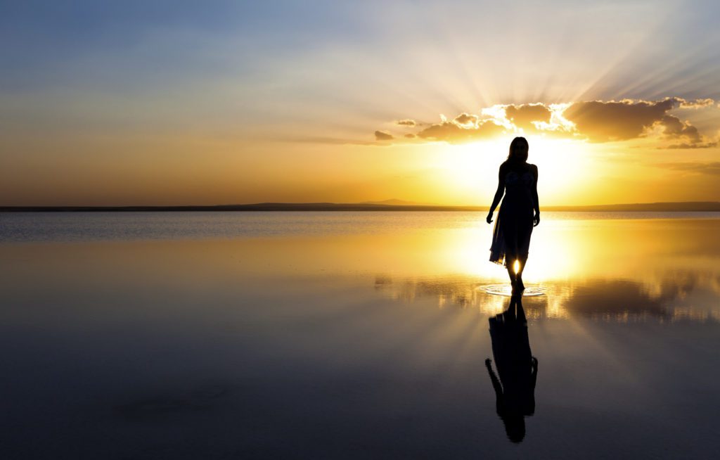Woman in sunset