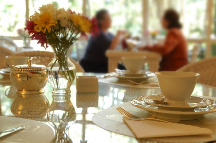 two_wealthy_women_having_afternoon_english_tea